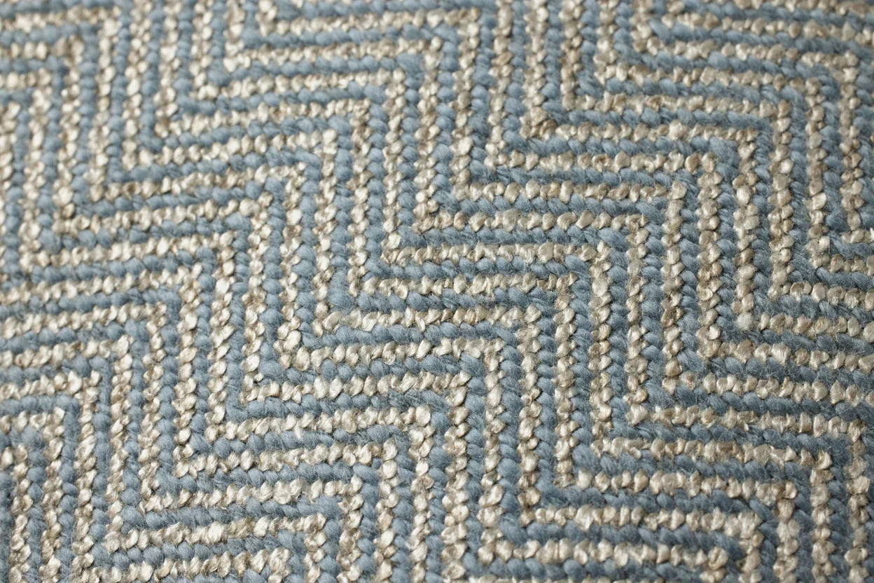 Coussin passepoilé cousu à la main