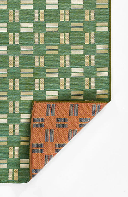 Tapis à grille emblématique