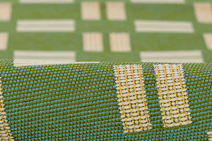 Tapis à grille emblématique