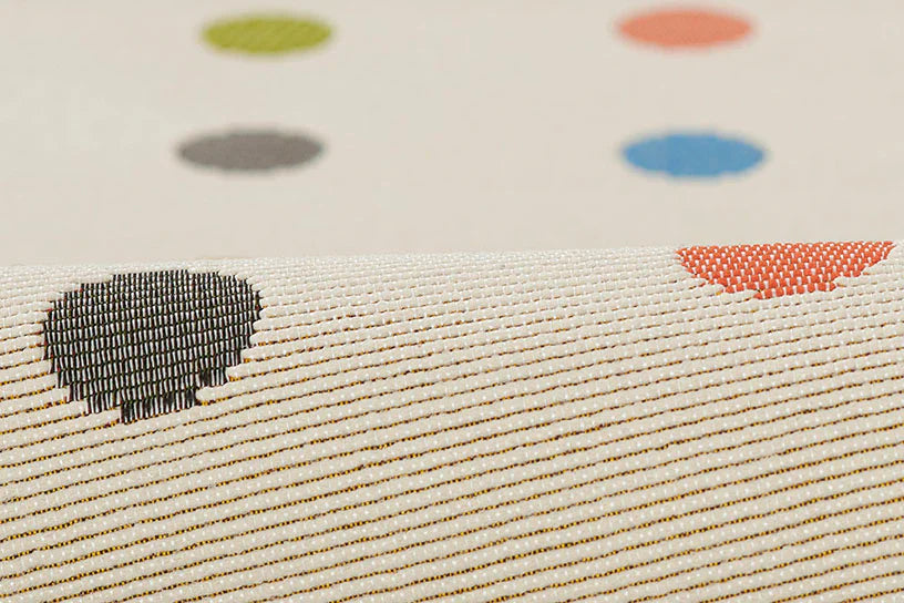 Tapis à pois emblématique